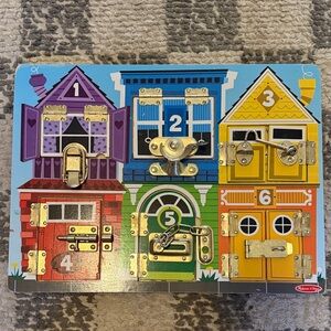 Melissa & Doug Colorful Latches Activity Board